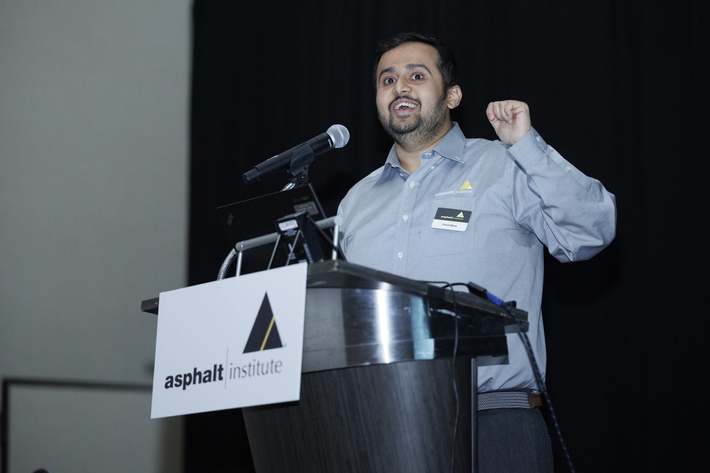 Dr. Bhat speaking at the Asphalt Institute podium
